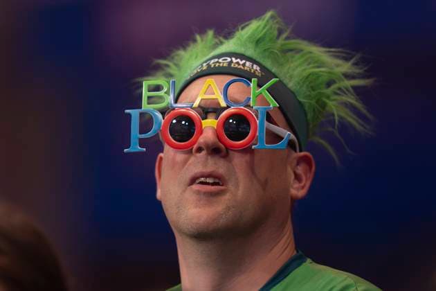 22nd July 2025; Winter Gardens, Blackpool, England; 2025 Betfred World Matchplay Darts Day 4; A fan in Blackpool glasses in the crowd during the second round  ActionPlus12815866 StevenxFlynn