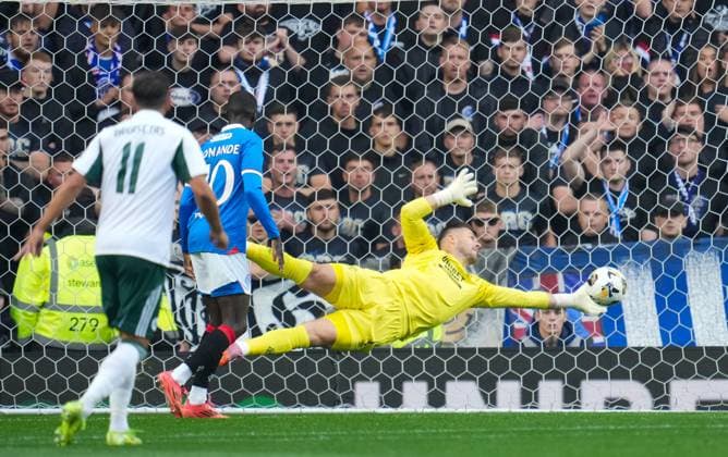 Rangers goalkeeper Jack Butland saves a shot from Filip Duricic of Panathinaikos. Rangers v Panathinaikos, UEFA Champions League, 2nd Qualifying Round, Football, Ibrox Stadium, Glasgow, UK - 22 Jul 2025Glasgow Ibrox Stadium United Kingdom EDITORIAL USE ONLY No use with unauthorised audio, video, data, fixture lists, club league logos or live services. Online in-match use limited to 120 images, no video emulation. No use in betting, games or single club league player publications. Copyright: xStuartxWallace Shutterstockx 15409267a