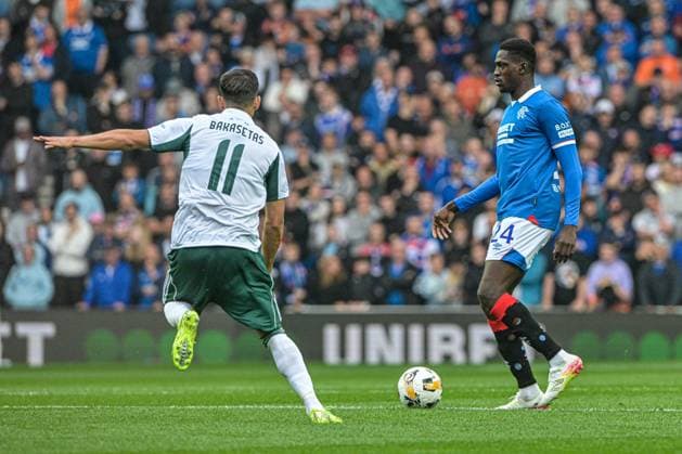 Rangers v Panathinaikos F.C. UEFA Champions League Neraysho Kasanwirjo of Rangers and Tasos Bakasetas of Panathinaikos F.C. during the UEFA Champions League Second Qualifying Round First Leg match at Ibrox Stadium, Glasgow UK Newspapers OUT Copyright: xJamiexJohnstonx FIL-21990-0062