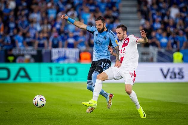 SLOVAN BRATISLAVA - ZRINJSKI MOSTAR Tigran Barseghyan of Slovan and Duje Dujmovic of Zrinjski during second qualifying round of UEFA Champions League football match between SK Slovan Bratislava and HSK Zrinjski Mostar. Bratislava, Slovakia, July 22, 2025. Copyright: xx 080A5966