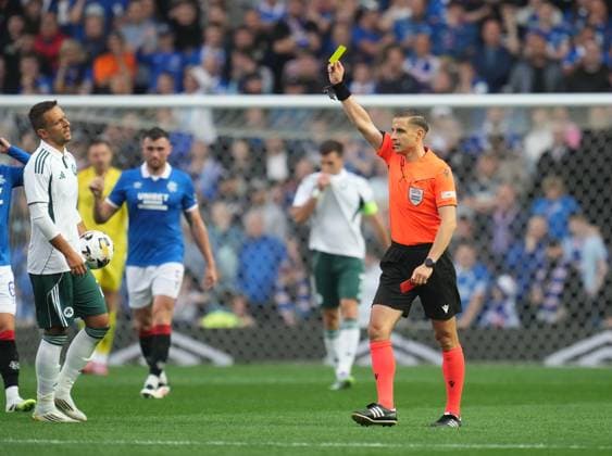 Referee Donatus Rumsas sends off Georgios Vagiannidis of Panathinaikos for a second yellow card offence following a foul on Findlay Curtis of Rangers. Rangers v Panathinaikos, UEFA Champions League, 2nd Qualifying Round, Football, Ibrox Stadium, Glasgow, UK - 22 Jul 2025Glasgow Ibrox Stadium United Kingdom EDITORIAL USE ONLY No use with unauthorised audio, video, data, fixture lists, club league logos or live services. Online in-match use limited to 120 images, no video emulation. No use in betting, games or single club league player publications. Copyright: xStuartxWallace Shutterstockx 15409267bc