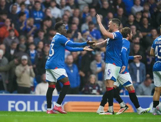 Djeidi Gassama of Rangers celebrates with team mate John Souttar after scoring to give Rangers a 2-0 lead. Rangers v Panathinaikos, UEFA Champions League, 2nd Qualifying Round, Football, Ibrox Stadium, Glasgow, UK - 22 Jul 2025Glasgow Ibrox Stadium United Kingdom EDITORIAL USE ONLY No use with unauthorised audio, video, data, fixture lists, club league logos or live services. Online in-match use limited to 120 images, no video emulation. No use in betting, games or single club league player publications. Copyright: xStuartxWallace Shutterstockx 15409267cp