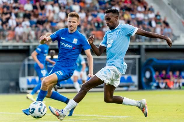 250722 Taha Ali of Malmö FF and Elvis Stuglis of FK RFS during the UEFA Champions League qualifier football match between FK RFS and Malmö FF on July 22, 2025 in Riga Photo Christian Örnberg BILDBYRAN COP 166 CO0590 fotboll football soccer fotball uefa champions league qualifiers champions league fk rfs malmö ff bbeng  Copyright: CHRISTIANxÖRNBERG BB250722CO106