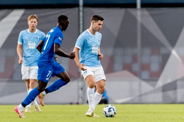 250722 Lasse Berg Johnsen of Malmö FF and Barthelemy Diedhiou of FK RFS during the UEFA Champions League qualifier football match between FK RFS and Malmö FF on July 22, 2025 in Riga Photo Christian Örnberg BILDBYRAN COP 166 CO0590 fotboll football soccer fotball uefa champions league qualifiers champions league fk rfs malmö ff bbeng  Copyright: CHRISTIANxÖRNBERG BB250722CO109