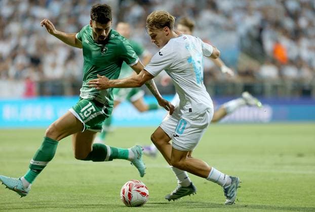 Rijeka v Ludogorets - UEFA Champions League Second Qualifying Round First Leg RIJEKA, CROATIA - JULY 22: Edvin Kurtulus of PFC Ludogorets Razgrad and Toni Fruk of HNK rijeka in action during the UEFA Champions League Second Qualifying Round First Leg match between Rijeka and Ludogorets at Stadion HNK Rijeka on July 22, 2025 in Rijeka, Croatia.  NelxPavletic PIXSELL