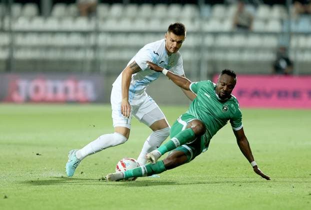Rijeka v Ludogorets - UEFA Champions League Second Qualifying Round First Leg RIJEKA, CROATIA - JULY 22: Mladen Devetak of HNK Rijeka and Bernard Tekpetey of PFC Ludogorets Razgrad in action during the UEFA Champions League Second Qualifying Round First Leg match between Rijeka and Ludogorets at Stadion HNK Rijeka on July 22, 2025 in Rijeka, Croatia.  NelxPavletic PIXSELL