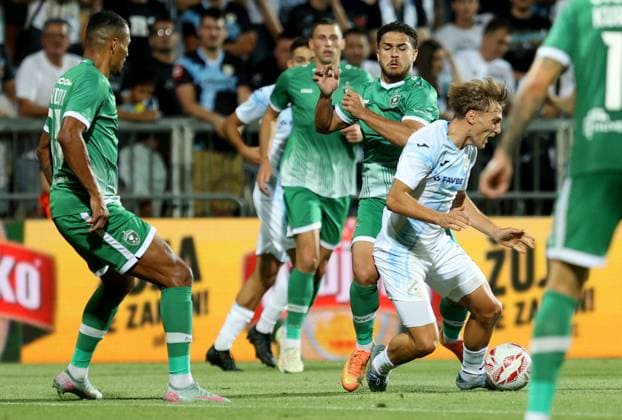 Rijeka v Ludogorets - UEFA Champions League Second Qualifying Round First Leg RIJEKA, CROATIA - JULY 22: Olivier Verdon and Caio Vidal of PFC Ludogorets Razgrad with Toni Fruk of HNK Rijeka during the UEFA Champions League Second Qualifying Round First Leg match between Rijeka and Ludogorets at Stadion HNK Rijeka on July 22, 2025 in Rijeka, Croatia.  NelxPavletic PIXSELL