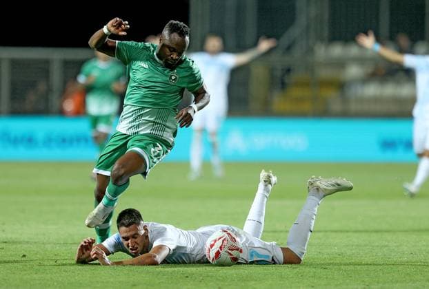 Rijeka v Ludogorets - UEFA Champions League Second Qualifying Round First Leg RIJEKA, CROATIA - JULY 22: Luka Menalo of HNK Rijeka and Bernard Tekpetey PFC Ludogorets Razgrad in action during the UEFA Champions League Second Qualifying Round First Leg match between Rijeka and Ludogorets at Stadion HNK Rijeka on July 22, 2025 in Rijeka, Croatia.  NelxPavletic PIXSELL