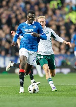 Rangers v Panathinaikos F.C. UEFA Champions League Nasser Djiga of Rangers (front) shields the ball from Karol Åöwiderski of Panathinaikos F.C. during the UEFA Champions League Second Qualifying Round First Leg match at Ibrox Stadium, Glasgow UK Newspapers OUT Copyright: xFredxPalmerx FIL-21991-0081