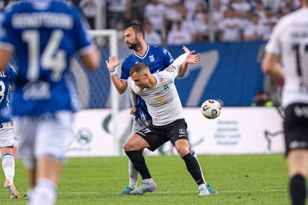 POZNAN 22.07.2025 MECZ II RUNDA ELIMINACYJNA LIGA MISTRZOW SEZON 2025 26: LECH POZNAN - BREIDABLIK --- UEFA CHAMPIONS LEAGUE SECOND QUALIFYING ROUND FIRST MATCH: LECH POZNAN - BREIDABLIK nz VALGEIR VALGEIRSSON ANTONIO MILIC FOT. ERNEST KOLODZIEJ 400mm.pl NEWSPIX.PL --- newspix.pl 