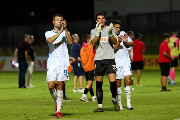Mykola Mykhailenko, goalkeeper Ruslan Neshcheret (centre), and Oleksandr Tymchyk of Dynamo Kyiv applaud after the UEFA Champions League Second qualifying round, 1st leg soccer match between Hamrun Spartans FC and FC Dynamo Kyiv at the Tony Bezzina Stadium, in Paola, Malta, on 22 July 2025. UEFA Champions League - Hamrun Spartans FC v FC Dynamo Kyev