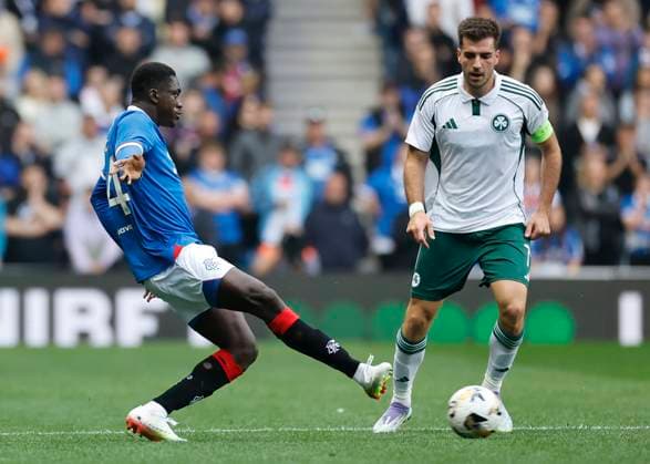 Rangers v Panathinaikos F.C. UEFA Champions League Nasser Djiga of Rangers (left) passes under pressure from Fotis Ioannidis of Panathinaikos F.C. during the UEFA Champions League Second Qualifying Round First Leg match at Ibrox Stadium, Glasgow UK Newspapers OUT Copyright: xFredxPalmerx FIL-21991-0084