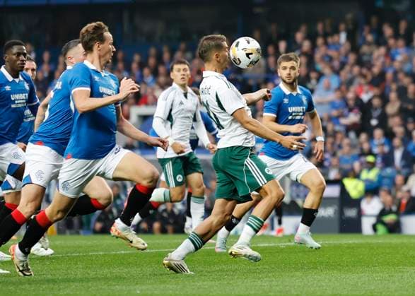 Rangers v Panathinaikos F.C. UEFA Champions League Nemanja MaksimoviÄ‡ of Panathinaikos F.C. controls the ball as Kieran Dowell of Rangers closes (left) during the UEFA Champions League Second Qualifying Round First Leg match at Ibrox Stadium, Glasgow UK Newspapers OUT Copyright: xFredxPalmerx FIL-21991-0103
