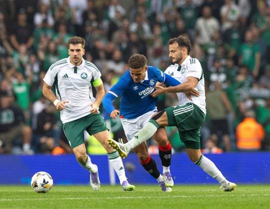 Max Aarons of Rangers in action with Pedro Chirivella of Panathinaikos during UEFA Champions League second qualifying round first leg at Ibrox Stadium, Glasgow. Rangers v Panathinaikos, UEFA Champions League, 2nd Qualifying Round, Football, Ibrox Stadium, Glasgow, UK - 22 Jul 2025Glasgow Ibrox Stadium United Kingdom EDITORIAL USE ONLY No use with unauthorised audio, video, data, fixture lists, club league logos or live services. Online in-match use limited to 120 images, no video emulation. No use in betting, games or single club league player publications. Copyright: xRangersxFC Shutterstockx 15409270bw