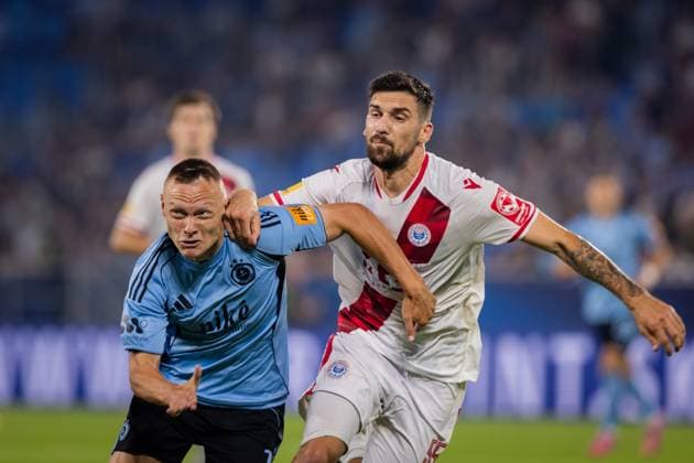 SLOVAN BRATISLAVA - ZRINJSKI MOSTAR Nino Marcelli of Slovan and Duje Dujmovic of Zrinjski during second qualifying round of UEFA Champions League football match between SK Slovan Bratislava and HSK Zrinjski Mostar. Bratislava, Slovakia, July 22, 2025. Copyright: xx slo_zri083