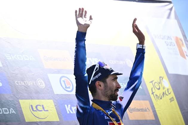 French Valentin Paret-Peintre of Soudal Quick-Step celebrates on the podium after winning stage 16 of the 2025 Tour de France cycling race, from Montpellier to Mont Ventoux (172 km), on Tuesday 22 July 2025 in France. The 112th edition of the Tour de France starts on Saturday 5 July in Lille, France, and will finish in Paris, France on the 27th of July. JASPERxJACOBS  x129791054x