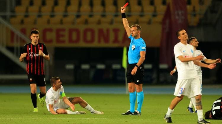 22.07.2025 Skopje KF Shkendija Tetovo-FCSB champion s league qualifiers second leg men s football Florin Tanase(L) FCSB react after received red card from Nathan Verboomen (C) Belgium referee :