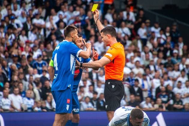 July 22, 2025, Copenhagen, Denmark: Vesel Limaj 8 of FC Drita receives a yellow card from Referee Martin Matosa during the UEFA Champions League 2025 26 Second Qualifying Round match between F.C. Copenhagen and FC Drita at Parken Stadium. Final score: F.C. Copenhagen 2:0 FC Drita. Copenhagen Denmark - ZUMAs197 20250722_aaa_s197_135 Copyright: xKristianxTuxenxLadegaardxBergx