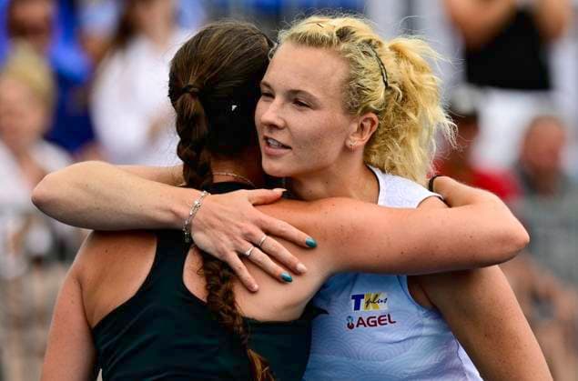 Czech tennis player Katerina Siniakova, right, and Dominika Salkova of Czech hug each other, as Siniakova won the match at the WTA, Tennis Damen Livesport Prague Open 2025 on the courts of TK Sparta Prague, in Prague, Czech Republic, on July 23, 2025. (CTKxPhoto RomanxVondrous) CTKPhotoP2025072305509  CTKPhotoP2025072305509