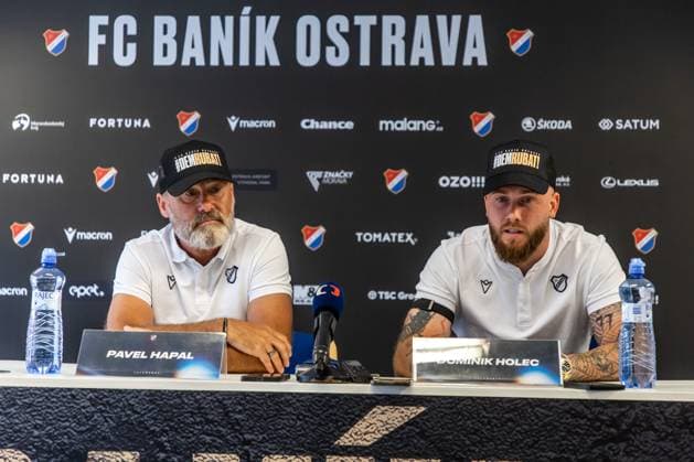 Head coach Pavel Hapal, left, and goalkeeper Dominik Holec of Banik Ostrava speak at a press conference, PK, Pressekonferenz prior to tomorrow s UEFA Europa League match: FC Banik Ostrava vs Legia Warszawa, in Ostrava, Czech Republic, July 23, 2025. (CTKxPhoto VladimirxPrycek) CTKPhotoP2025072306960  CTKPhotoP2025072306960