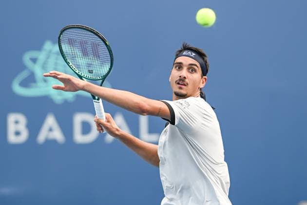 July 23, 2025, Washington, D.C, U.S: LORENZO SONEGO hits an overhead during his match against Matteo Arnaldi at the Rock Creek Tennis Center. Washington U.S - ZUMAg196 20250723_zap_g196_040 Copyright: xKylexGustafsonx