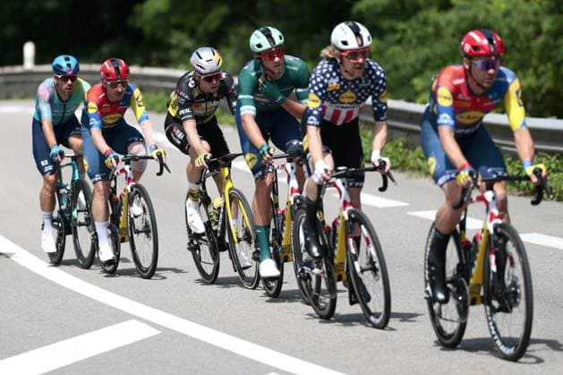 Belgian Wout van Aert of Team Visma-Lease a Bike, Italian Jonathan Milan of Lidl-Trek and US Quinn Simmons of Lidl-Trek pictured in action during stage 18 of the 2025 Tour de France cycling race, from Vif to Courchevel Col de la Loze, on Thursday 24 July 2025 in France. The 112th edition of the Tour de France starts on Saturday 5 July in Lille, France, and will finish in Paris, France on the 27th of July. POOLxLUCAxBETTINI  x129915623x