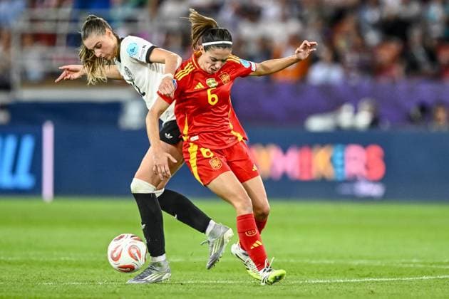 Jule Brand Germany and Aitana Bonmati Spain battle for the ball during the UEFA Women s EURO 2025 Semi Final match between Germany and Spain at Stadion Letzigrund on July 23, 2025 in Zurich, Switzerland Photo by Harry Langer DeFodi Images