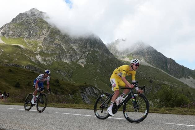 Slovenian Primoz Roglic of RedBull-BORA-hansgrohe and Slovenian Tadej Pogacar of UAE Team Emirates pictured in action at the Col de la Madeleine during stage 18 of the 2025 Tour de France cycling race, from Vif to Courchevel Col de la Loze, on Thursday 24 July 2025 in France. The 112th edition of the Tour de France starts on Saturday 5 July in Lille, France, and will finish in Paris, France on the 27th of July. POOLxLUCAxBETTINI  x129931335x