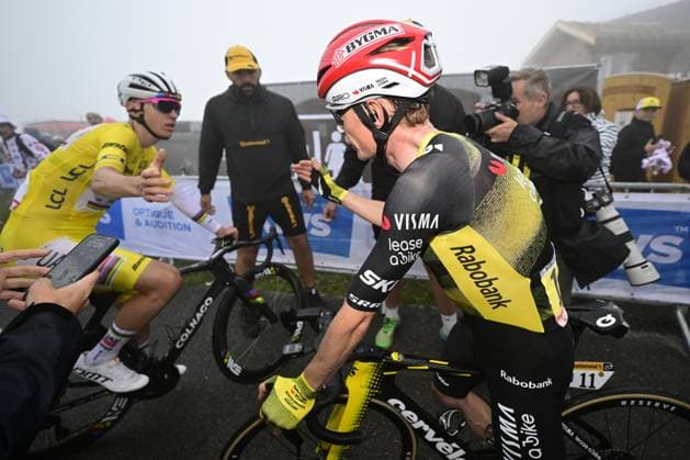 Slovenian Tadej Pogacar of UAE Team Emirates shake hands with Danish Jonas Vingegaard Hansen of Team Visma-Lease a Bike after finishing stage 18 of the 2025 Tour de France cycling race, from Vif to Courchevel Col de la Loze, on Thursday 24 July 2025 in France. The 112th edition of the Tour de France starts on Saturday 5 July in Lille, France, and will finish in Paris, France on the 27th of July. DIRKxWAEM  x129936269x