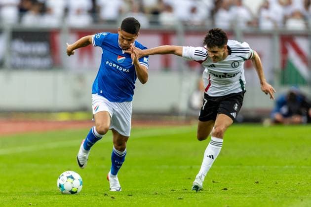 From left Ewerton of Ostrava and Bartosz Kapustka of Warsaw in action during the European League 2nd qualifying round opening match Banik Ostrava vs Legia Warsaw in Ostrava, Czech Republic, July 24, 2025. (CTKxPhoto VladimirxPrycek) CTKPhotoP2025072408094  CTKPhotoP2025072408094