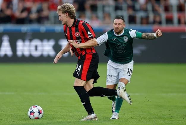 Oliver Sorensen of FC Midtjylland and Martin Boyle of Hibernian in action Midtjylland v Hibernian, UEFA Europa League, 2nd Qualifying Round, First Leg, Football, MCH Arena, Herning, Denmark - 24 Jul 2025Herning MCH Arena Denmark EDITORIAL USE ONLY No use with unauthorised audio, video, data, fixture lists, club league logos or live services. Online in-match use limited to 120 images, no video emulation. No use in betting, games or single club league player publications. Copyright: xJohnnyxPedersen Shutterstockx 15410838aj