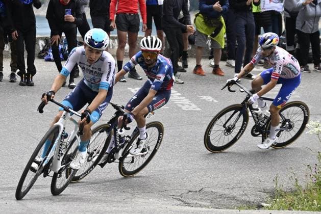 Slovenian Primoz Roglic of RedBull-BORA-hansgrohe, French Valentin Paret-Peintre of Soudal Quick-Step and French Lenny Martinez of Bahrain Victorious pictured in action during stage 19 of the 2025 Tour de France cycling race, from Albertville to La Plagne (130km), on Friday 25 July 2025 in France. The 112th edition of the Tour de France starts on Saturday 5 July in Lille, France, and will finish in Paris, France on the 27th of July. JASPERxJACOBS  x129996281x