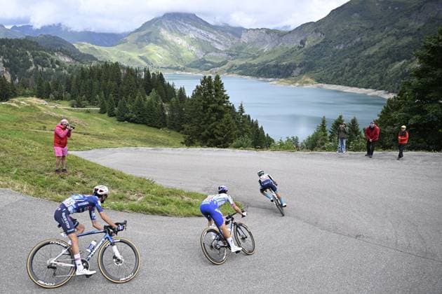 French Valentin Paret-Peintre of Soudal Quick-Step, Slovenian Primoz Roglic of RedBull-BORA-hansgrohe and French Lenny Martinez of Bahrain Victorious pictured in action during stage 19 of the 2025 Tour de France cycling race, from Albertville to La Plagne (130km), on Friday 25 July 2025 in France. The 112th edition of the Tour de France starts on Saturday 5 July in Lille, France, and will finish in Paris, France on the 27th of July. JASPERxJACOBS  x129996600x