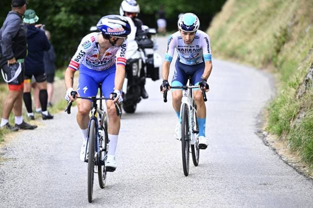 Slovenian Primoz Roglic of RedBull-BORA-hansgrohe and French Lenny Martinez of Bahrain Victorious pictured in action during stage 19 of the 2025 Tour de France cycling race, from Albertville to La Plagne (130km), on Friday 25 July 2025 in France. The 112th edition of the Tour de France starts on Saturday 5 July in Lille, France, and will finish in Paris, France on the 27th of July. JASPERxJACOBS  x129997501x
