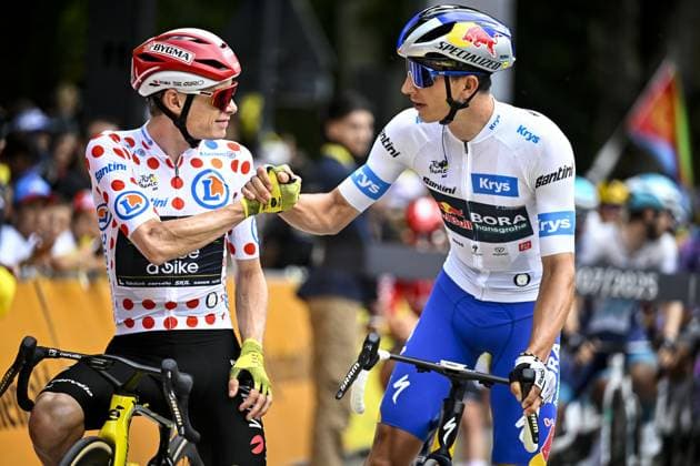 Danish Jonas Vingegaard Hansen of Team Visma-Lease a Bike and German Florian Lipowitz of RedBull-BORA-hansgrohe pictured ahead of the stage 20 of the 2025 Tour de France cycling race, from Nantua to Montpellier (185km), on Saturday 26 July 2025 in France. The 112th edition of the Tour de France starts on Saturday 5 July in Lille, France, and will finish in Paris, France on the 27th of July. JASPERxJACOBS  x130042222x