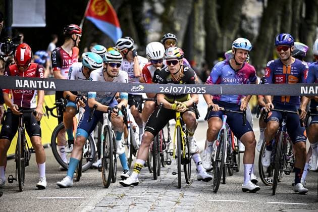 Belgian Wout van Aert of Team Visma-Lease a Bike and Canadian Michael Russell Woods of Israel-Premier Tech pictured ahead of the stage 20 of the 2025 Tour de France cycling race, from Nantua to Montpellier (185km), on Saturday 26 July 2025 in France. The 112th edition of the Tour de France starts on Saturday 5 July in Lille, France, and will finish in Paris, France on the 27th of July. JASPERxJACOBS  x130042389x
