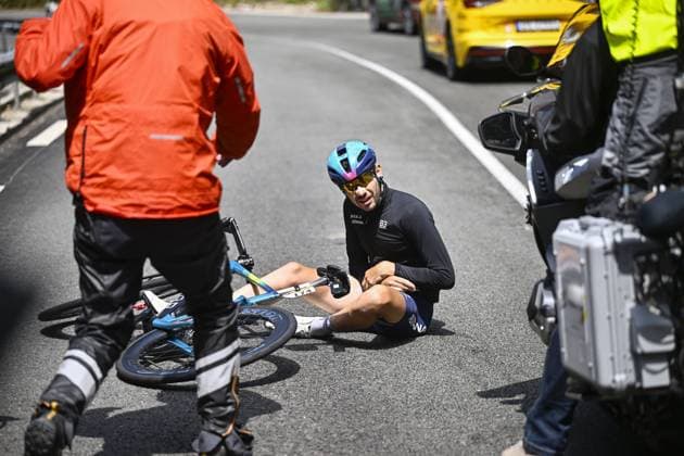 French Clement Champoussin of XDS Astana Team pictured after a crash during stage 20 of the 2025 Tour de France cycling race, from Nantua to Montpellier (185km), on Saturday 26 July 2025 in France. The 112th edition of the Tour de France starts on Saturday 5 July in Lille, France, and will finish in Paris, France on the 27th of July. JASPERxJACOBS  x130047825x