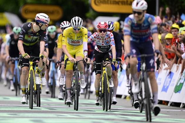 Belgian Wout van Aert of Team Visma-Lease a Bike, Slovenian Tadej Pogacar of UAE Team Emirates and Danish Jonas Vingegaard Hansen of Team Visma-Lease a Bike cross the finish line of stage 20 of the 2025 Tour de France cycling race, from Nantua to Montpellier (185km), on Saturday 26 July 2025 in France. The 112th edition of the Tour de France starts on Saturday 5 July in Lille, France, and will finish in Paris, France on the 27th of July. DIRKxWAEM  x130056828x