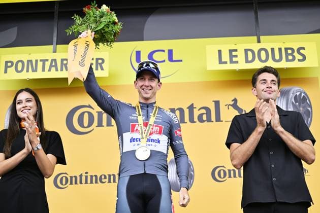 Australian Kaden Groves of Alpecin-Deceuninck celebrates on the podium after winning stage 20 of the 2025 Tour de France cycling race, from Nantua to Montpellier (185km), on Saturday 26 July 2025 in France. The 112th edition of the Tour de France starts on Saturday 5 July in Lille, France, and will finish in Paris, France on the 27th of July. DIRKxWAEM  x130057713x