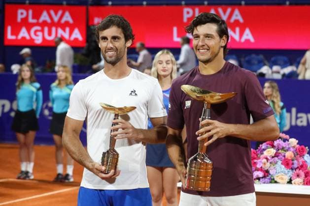 Umag, Croatia, 260725. 35th Plava Laguna Croatia Open Umag. Final. Trophy ceremony. In the photo: Carlos Taberner i Luciano Darderi. Photo: Goran Sebelic CROPIX Copyright: xxGoranxSebelicx atp_finale29-260725