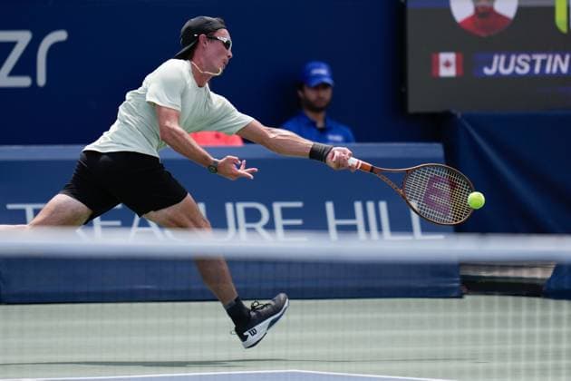 July 26, 2025, Toronto, Ontario, Canada: Justin Boulais of Canada plays a forehand against James Duckworth of Australia during the Men s Singles first round match on day 1 of the ATP, Tennis Herren Masters 1000 National Bank Open at Sobeys Stadium. on July 26, 2025 in Toronto, Canada. Toronto Canada - ZUMAe321 20250726_zsa_e321_069 Copyright: xLeonardoxRamirezx