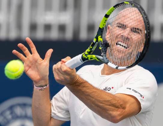 (250727) -- TORONTO, July 27, 2025 -- Adrian Mannarino of France returns the ball during the men s singles qualifying match between Adrian Mannarino of France and Juan Carlos Aguilar of Canada at the 2025 National Bank Open tennis tournament in Toronto, Canada, on July 26, 2025. (Photo by Xinhua) (SP)CANADA-TORONTO-TENNIS-NATIONAL BANK OPEN-MEN S SINGLES-QUALIFYING ZouxZheng 