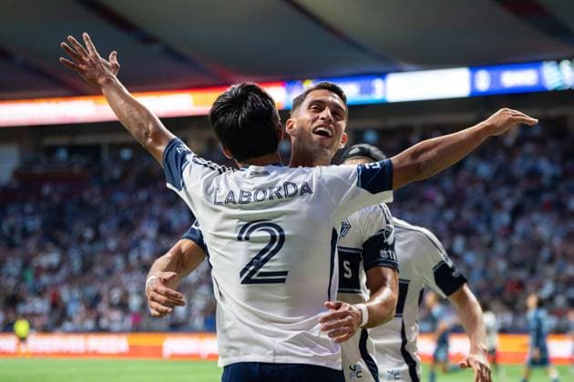 July 26, 2025, Vancouver, Bc, CANADA: Vancouver Whitecaps Mathias Laborda (2) celebrates his goal against Sporting Kansas City, with Daniel Rios (14) during the second half of an MLS, Fussball Herren, USA soccer match in Vancouver, on Saturday, July 26, 2025. Canada News - July 26, 2025  - ZUMAc35_ 20250726_zaf_c35_038 Copyright: xEthanxCairnsx