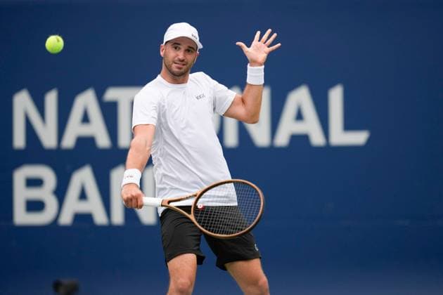 ATP, Tennis Herren Masters 1000 National Bank Open Toronto Presented by Rogers 2025 - Day 1 Dan Martin of Canada plays a backhand against Taro Daniel of Japan during the Men s Singles first round match on day 1 of the ATP Masters 1000 National Bank Open at Sobeys Stadium. on July 26, 2025 in Toronto, Canada. Toronto Ontario Canada Copyright: xLeonardoxRamirezx