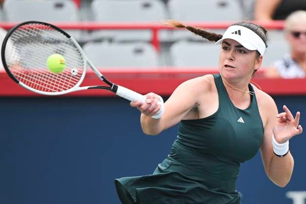 July 27, 2025, Montreal, Pq, Canada: Marina Stakusic, of Canada, plays a shot to Jaqueline Cristian, of Romania, during their first round match at the National Bank Open tennis tournament in Montreal, Sunday, July 27, 2025. Marina Stakusic, Jaqueline Cristian,  - ZUMAc35_ 20250727_zaf_c35_002 Copyright: xGrahamxHughesx