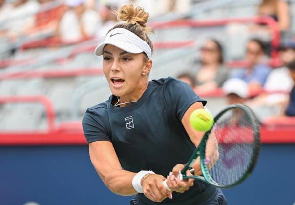 July 27, 2025, Montreal, Pq, Canada: Jaqueline Cristian, of Romania, plays a shot to Marina Stakusic, of Canada, during their first round match at the National Bank Open tennis tournament in Montreal, Sunday, July 27, 2025. Marina Stakusic, Jaqueline Cristian,  - ZUMAc35_ 20250727_zaf_c35_003 Copyright: xGrahamxHughesx