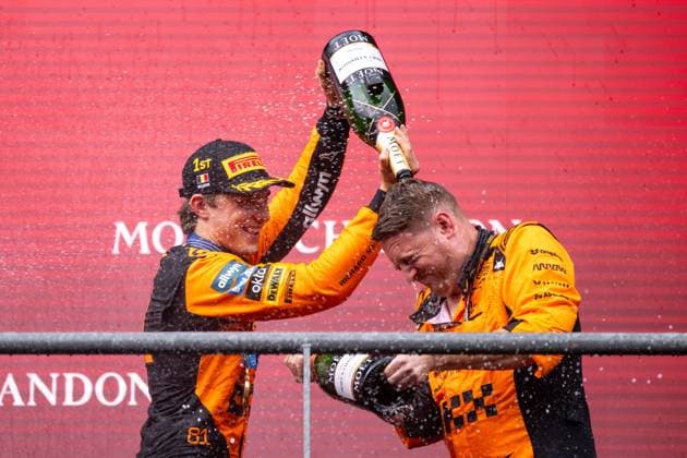 Oscar Piastri McLaren Formula 1 Team, Australia, 81 , McLaren Trophy Delegate cheering on the podium at the podium ceremony and spraying champagne, BEL, Formula 1 World Championship, Moet Chandon Grand Prix of Belgium, Circuit de Spa Francorchamps, Race, 2025 season, 27 07 2025 BEL, Formula 1 World Championship, Moet Chandon Grand Prix of Belgium, Circuit de Spa Francorchamps, Race, 2025 season, 27 07 2025 Spa Francorchamps Copyright: xEibner-Pressefoto Memmlerx EP_MMR