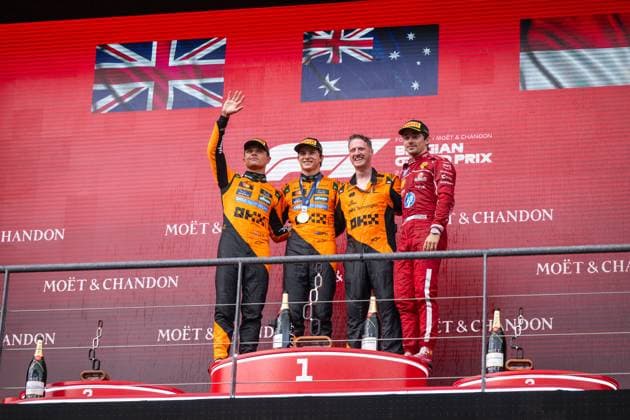 Lando Norris McLaren Formula 1 Team, Great Britain, 04 , Oscar Piastri McLaren Formula 1 Team, Australia, 81 , McLaren Trophy Delegate, Charles Leclerc Scuderia Ferrari HP, Monaco, 16 on the podium at the podium ceremony, BEL, Formula 1 World Championship, Moet Chandon Grand Prix of Belgium, Circuit de Spa Francorchamps, Race, 2025 season, 27 07 2025 BEL, Formula 1 World Championship, Moet Chandon Grand Prix of Belgium, Circuit de Spa Francorchamps, Race, 2025 season, 27 07 2025 Spa Francorchamps Copyright: xEibner-Pressefoto Memmlerx EP_MMR