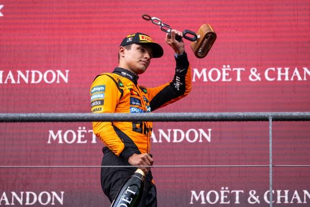 Lando Norris McLaren Formula 1 Team, Great Britain, 04 cheers on the podium at the podium ceremony with trophy for 2nd place, BEL, Formula 1 World Championship, Moet Chandon Grand Prix of Belgium, Circuit de Spa Francorchamps, Race, Season 2025, 27 07 2025 BEL, Formula 1 World Championship, Moet Chandon Grand Prix of Belgium, Circuit de Spa Francorchamps, Race, Season 2025, 27 07 2025 Spa Francorchamps Copyright: xEibner-Pressefoto Memmlerx EP_MMR