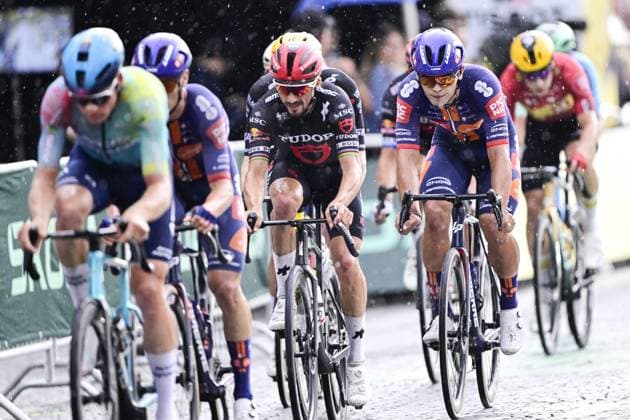 French Julian Alaphilippe of Tudor Pro Cycling Team and British Edgar Oscar Onley of Team Picnic PostNL pictured in action during stage 21 of the 2025 Tour de France cycling race, from Mantes-la-Ville to Paris (120km), on Sunday 27 July 2025 in France. The 112th edition of the Tour de France starts on Saturday 5 July in Lille, France, and will finish in Paris, France on the 27th of July. DIRKxWAEM  x130126734x